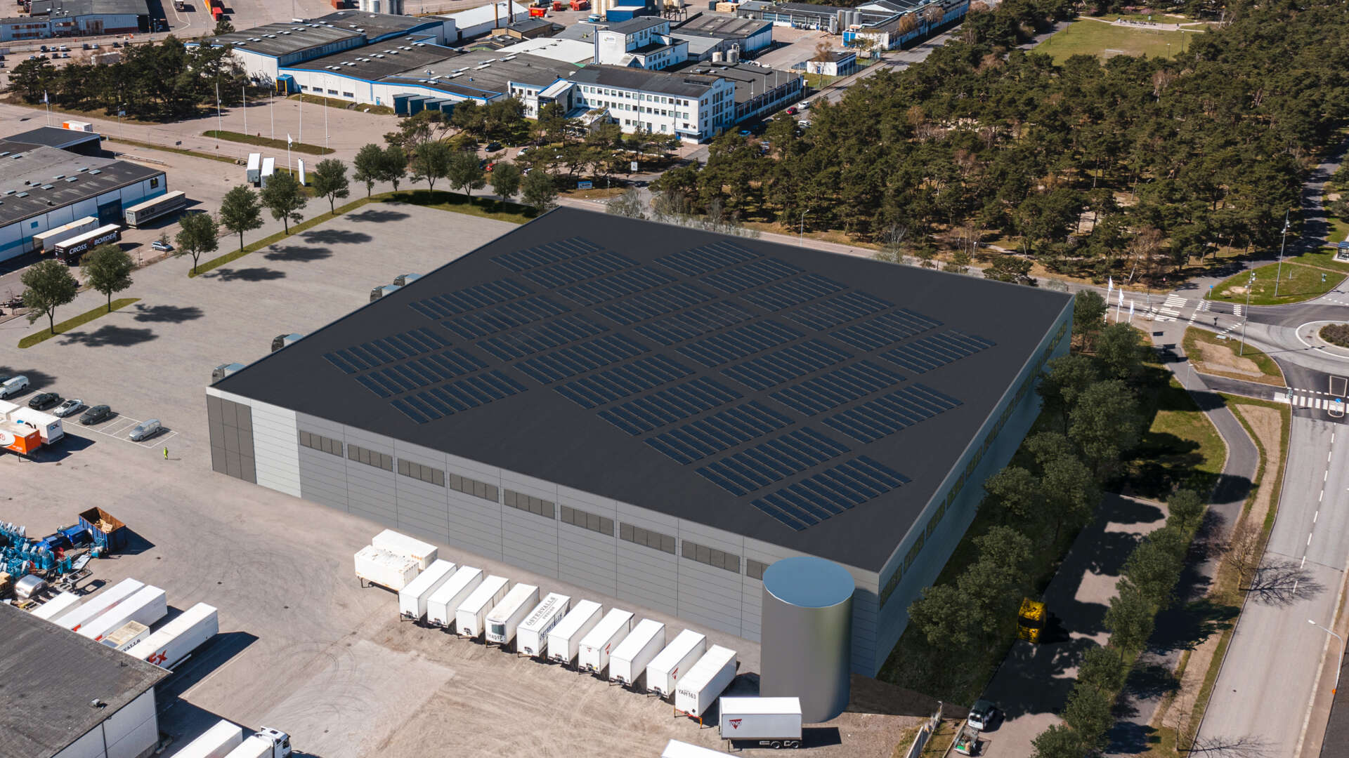 Visionsbild av en logistiklokal med lastbilar parkerade utanför. 