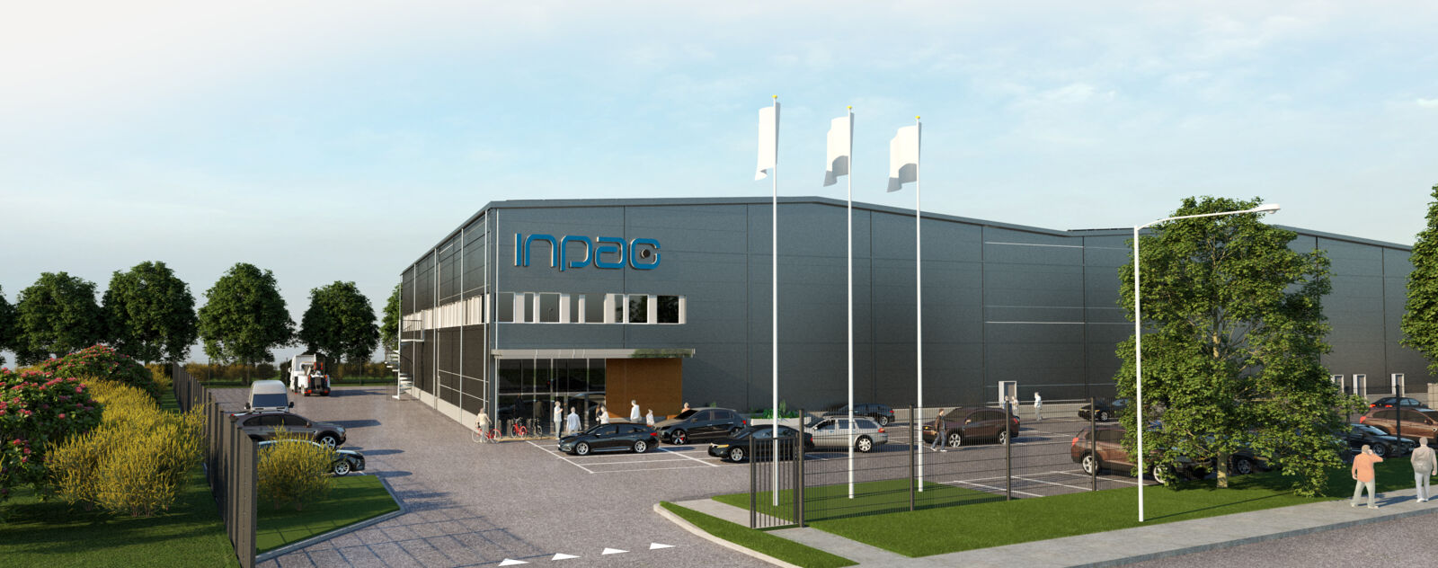 Visionsbild av Inpacs produktionslokal i Lund, en grå fastighet med högt i tak.