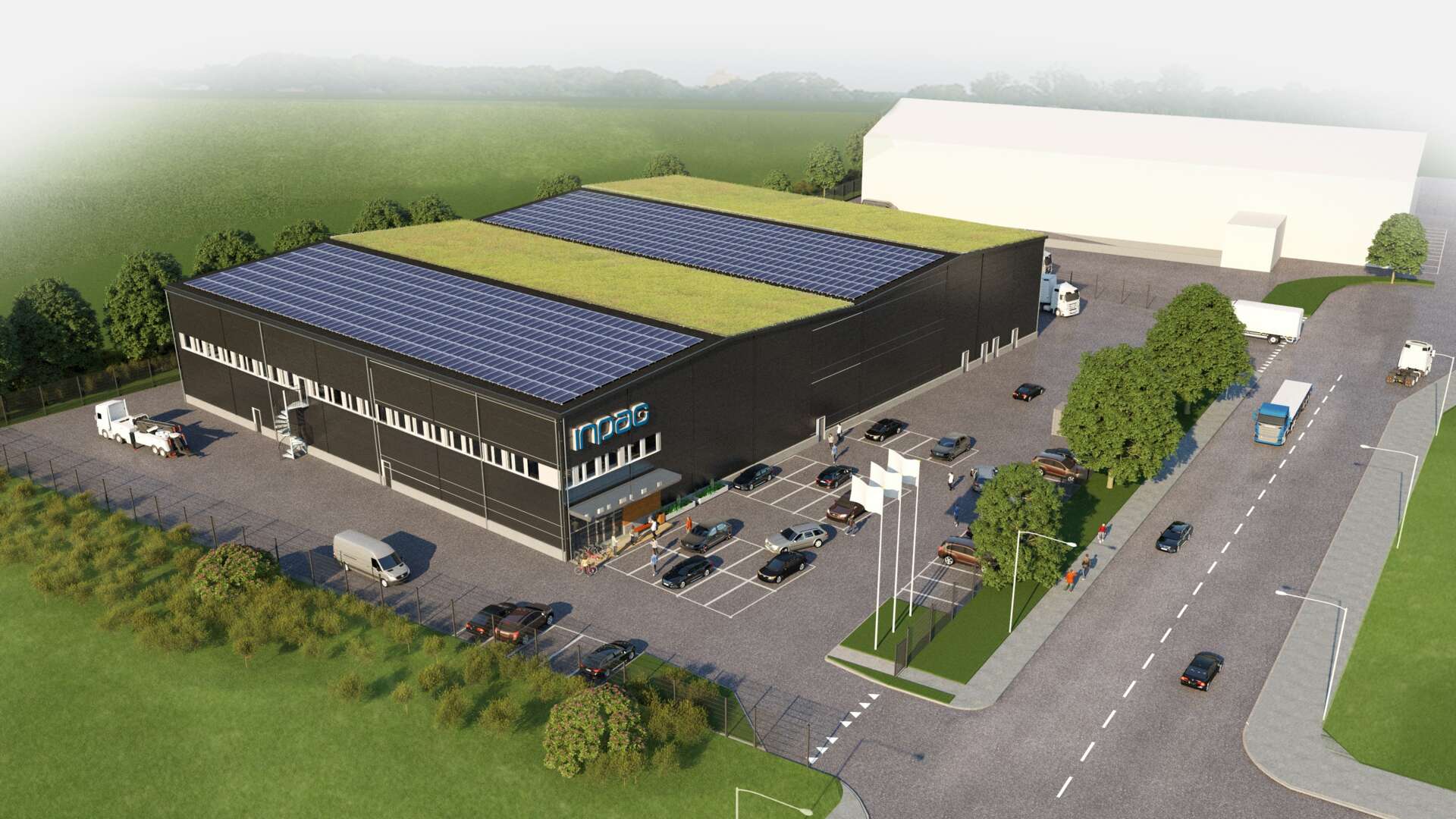 Visionsbild av Inpacs produktionslokaler, med solpaneler på taket. 